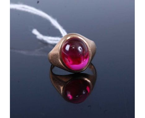 A 9ct gold and cabochon ruby glass set signet ring, 4.6g, size K