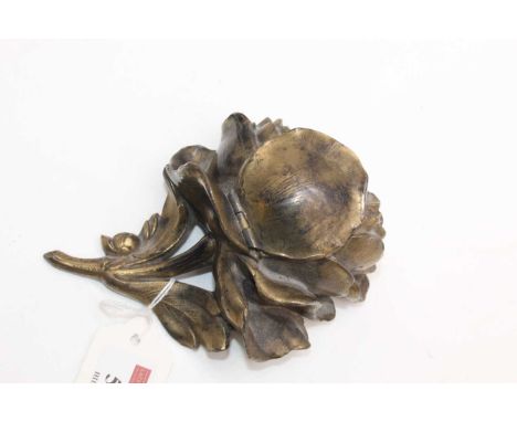A brass alloy novelty desktop inkwell in the form of a rose, length 14cm