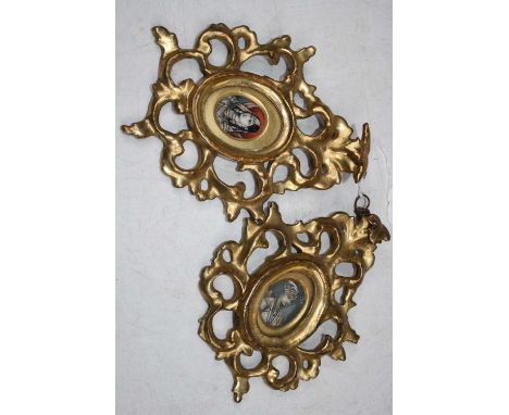 20th century Indian school - a pair of portrait miniatures within gilt openwork frames 