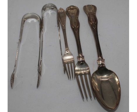 A Victorian silver serving spoon in the Kings pattern, together with a matching table fork, a Victorian silver pastry fork, a