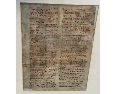 A Medieval musical manuscript leaf on vellum,  with mention of the Archangel Michael, 16 lines in double column, elaborate ca