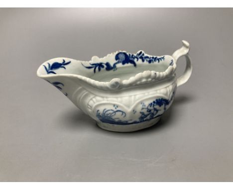 A Worcester Two Porter pattern blue and white small sauceboat circa 1760-5, workman's mark, length 13cm
