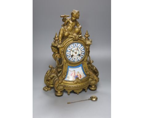 A 19th century Louis XV style ormolu and porcelain 'cherub' mantel clock, height 42cm