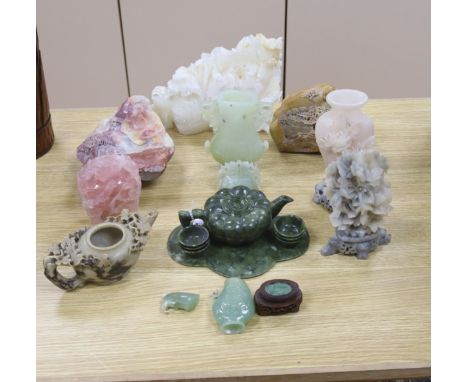 A group of Chinese hardstone and soapstone vessels and boulder carvings, largest 23cm