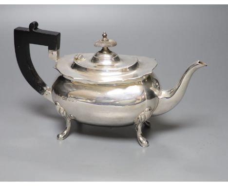 A George V silver teapot, Walker &amp; Hall, Sheffield, 1922,gross 18oz.
