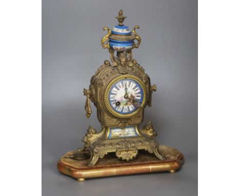A 19th century French gilt metal and enamel mantel clock