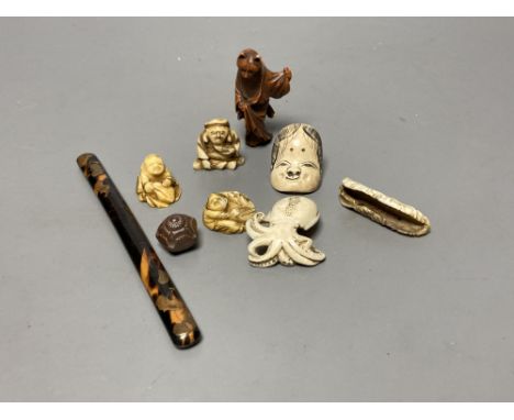 A quantity of assorted Japanese carvings, netsuke, etc.