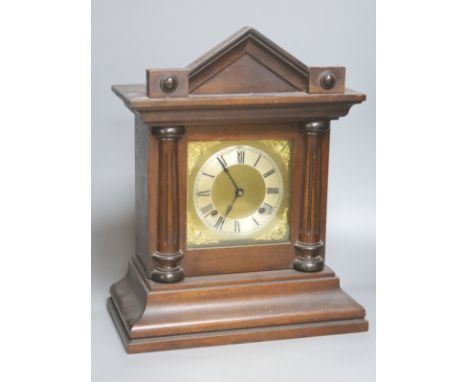 A small mahogany mantel clock, architectural case, height 42cm