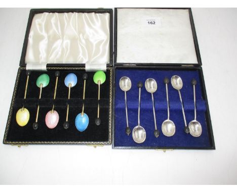 Cased Set of 6 Silver Coffee Spoons, Sheffield 1917, along with a Cased Set of 6 Gilt and Enamel Coffee Spoons 