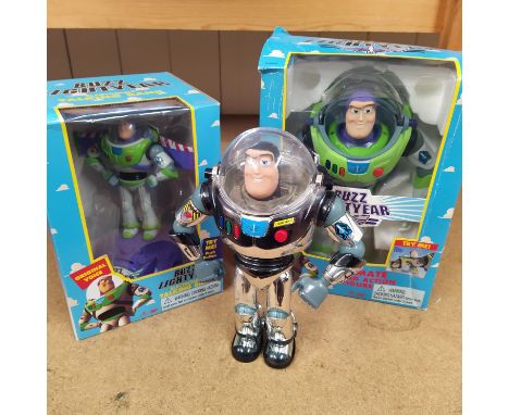 Three 'Buzz Lightyear' figures, two boxed the other a 'silver' limited edition