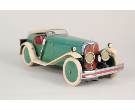A Meccano No.2 Constructor Car in green/cream with additional spare parts, instruction leaflet, metal tin etc, a very fine co