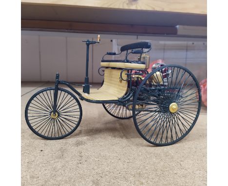 A model of a Benz Patent motorwagen, the first automobile (missing brake lever), approx size height 6 1/2", length 11", width
