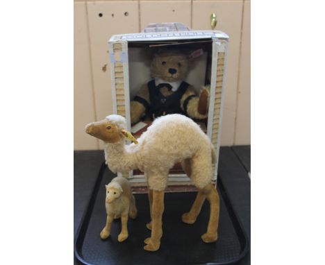 A Steiff camel 1528 together with a small Steiff camel and a boxed 100th anniversary JC Penny bear