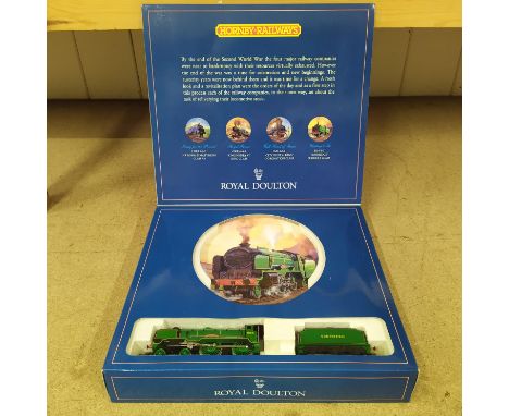 A boxed Hornby/Royal Doulton 50th anniversary collection, containing plate with 00 gauge engine and tender 'Tonbridge'