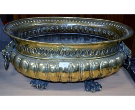 LARGE BRASS PLANTER WITH GOAT MOUNT HANDLES & CLAW FEET     