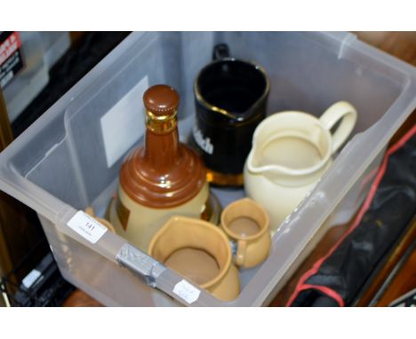 BOX CONTAINING BELLS DECANTER & VARIOUS PUB JUGS     