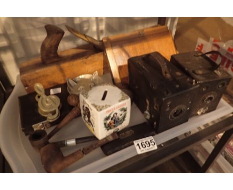 Tray of mixed collectables including black plain box cameras, pipes, scales and glasses
