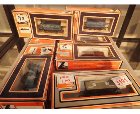 Eight Lima boxed freight wagons
