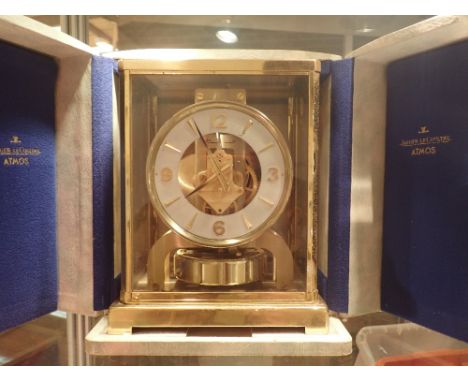 Jaeger Lecoultre Atmos clock in original box   CONDITION REPORT:  This item is working at lotting. 22.5 x 17 cm