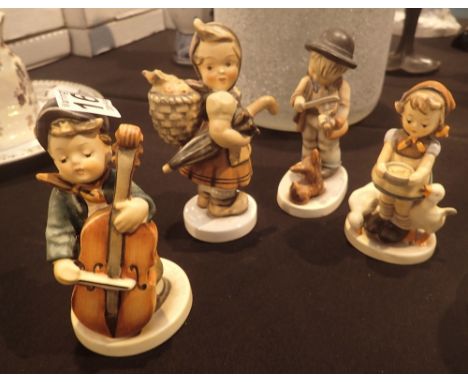 Four Goebel figurines