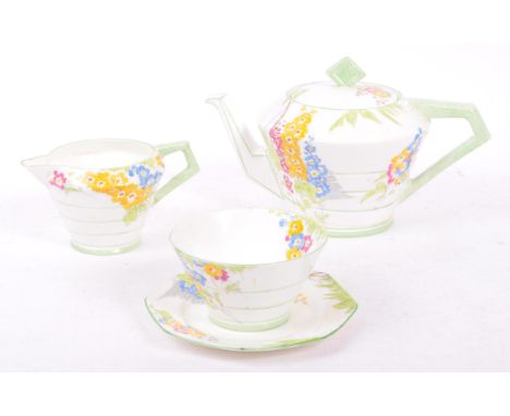 Royal Paragon - A vintage early 20th century circa 1930s Art Deco bachelors tea service. To include teapot, saucer, sugar pot