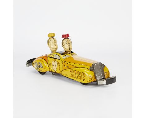 Marx lithographed tin wind-up toy in the form of Blondie's Jalopy, ca. 1935. The driver's heads peek out from the top of the 