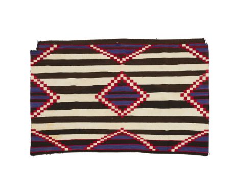 Navajo chief's-style revival blanket, early- to mid-20th century. With diamonds of blue, black, and red surrounded by rectang