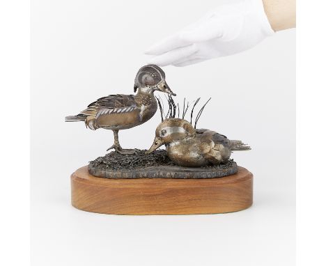 Jim Dolan (American, b. 1949). Steel sculpture in the form of a pair of wood ducks, 1983. Signed and dated along the base. Af