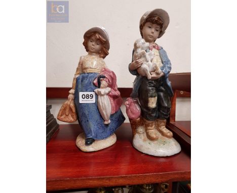 PAIR OF EARLY NAO FIGURES (BOY AND GIRL) 
