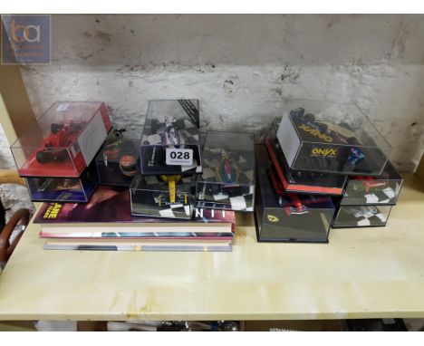 SHELF LOT OF EDDIE IRVINE MODEL CARS, ONE AUTOGRAPHED BY EDDIE IRVINE 