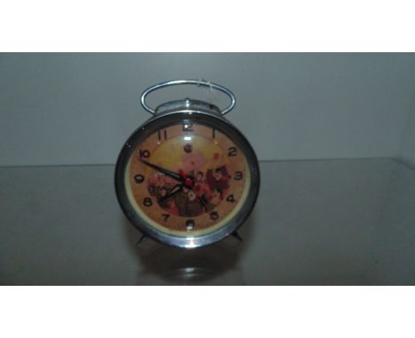 Chinese communist clock with moving hand holding Mao Tse-tung's red book 