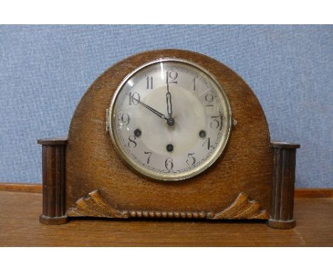 An Art Deco oak Whittington chime mantel clock, movement stamped Haller