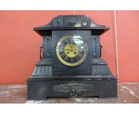 A 19th Century French Belge noir mantel clock