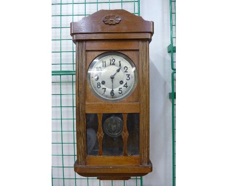 An oak wall clock