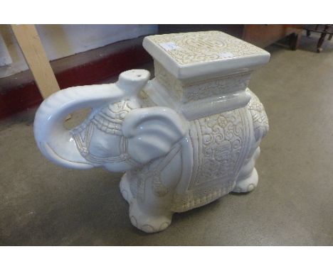 A ceramic elephant garden seat