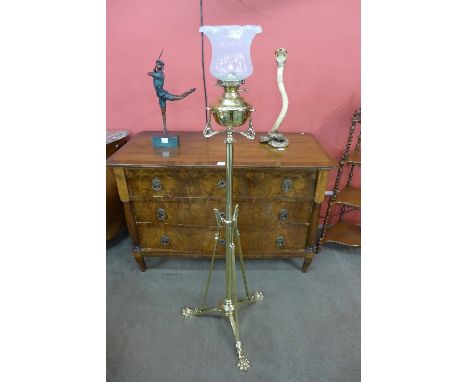 An Art Nouveau brass telescopic standard oil lamp