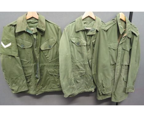 Three Various Combat Smocksconsisting 2 x combat, sateen smocks in green cotton.  Patch chest pockets and lower bellow pocket