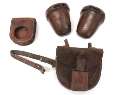 Four Items of Leather Equipmentconsisting leather, horseshoe and sword case.  Half oval case with top flap.  Front loop to se