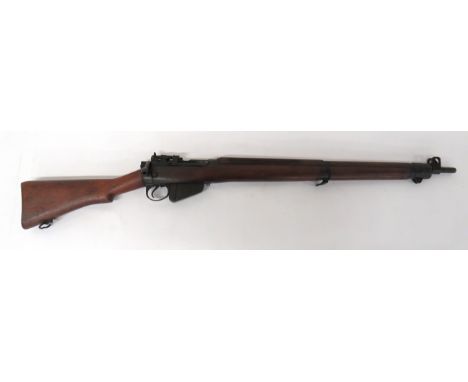 Deactivated Enfield No 4 Rifle .303, 25 inch barrel. &nbsp;Front sight with protective ears. &nbsp;Blackened breech with rear