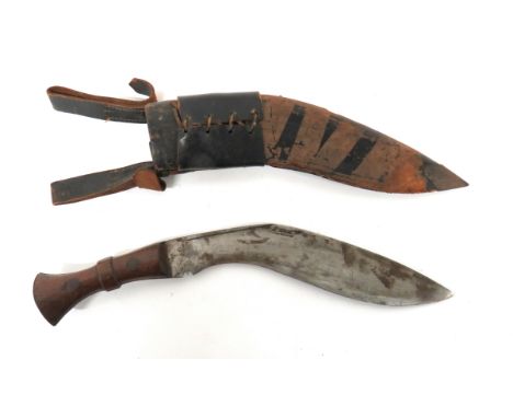 20th Century Indian Kukri12 1/4 inch, single edged blade of typical form.  Narrow back edge fuller.  Blade stamped "D.K.W.". 