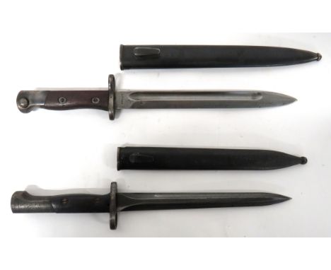Belgium FN1949 SLR Bayonet And Siamese Mauser BayonetBelgium FN example.  9 inch, double edged blade.  Steel muzzle ring, cro