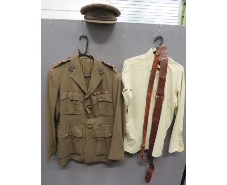 WW2 General List Officer's Service Dress Uniformconsisting khaki, single breasted, open collar tunic.  Pleated chest pockets 