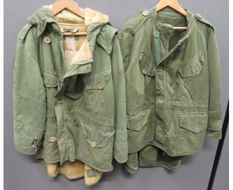 Two Post War British Combat Smocksconsisting "Parka Middle" in heavy green cotton.  Angled top pockets and lower patch pocket