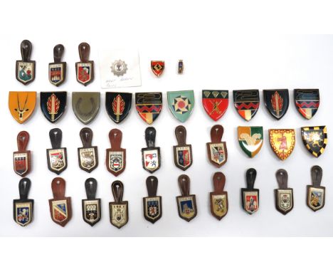 French Police Breast Badgesplated and enamel badges on leather hanging tabs.  Areas include Poitiers ... Lille .. La Rochelle