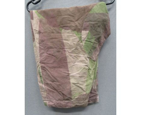 WW2 Dated Camouflaged Over Trousersbrown, green and tan camouflaged cotton, wide leg, over trousers.  Front of left leg with 