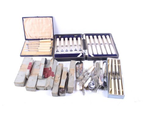 A collection of silver plated flatware. Including a canteen of knives, a selection of spoons, knives and more, some in boxes