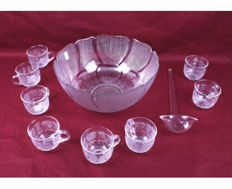 A French mid century Arcoroc punch bowl set. Including eight cups and a ladle. Diameter 30cm H15cm