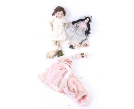 A collection of assorted vintage dolls. Including one marked Heubach Koppelsdorf 250.13/0a to the back of the neck, H26cm, an