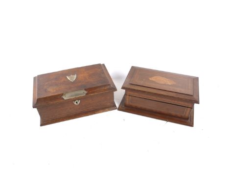 Two vintage wood and inlaid storage boxes. One inlaid with a marquestry shell and stringing, with two removeable fitted trays