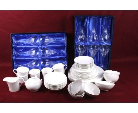 Six piece white porcelain tea dinner set and twelve wine glasses. Including Wedgwood Delphi White plates and bowls with Royal